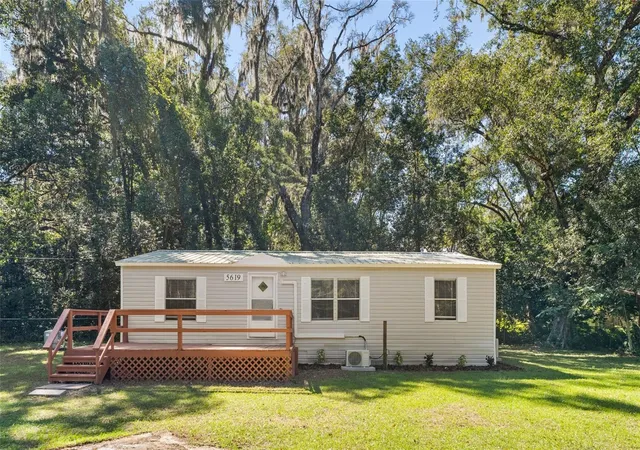Photo 1 of Manufactured home for sale at 5619 Ne 79th Place, Gainesville, FL 32609 | MLS# OM734430 | Listing updated on 2026-10-24