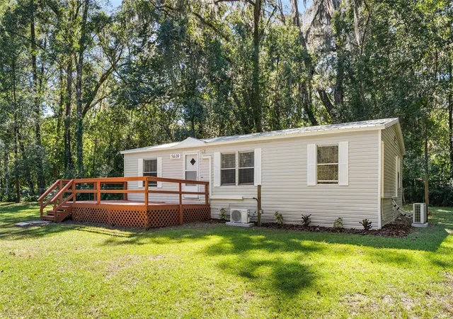 Photo 2 of Manufactured home for sale at 5619 Ne 79th Place, Gainesville, FL 32609 | MLS# OM734430 | Listing updated on 2026-10-24