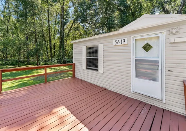 Photo 3 of Manufactured home for sale at 5619 NE 79th Place, Gainesville, FL 32609 | MLS# OM734430 | Listing updated on 2026-10-24