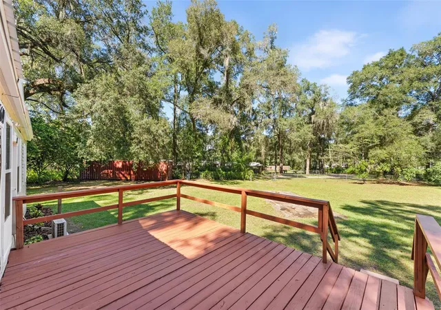 Photo 4 of Manufactured home for sale at 5619 NE 79th Place, Gainesville, FL 32609 | MLS# OM734430 | Listing updated on 2026-10-24