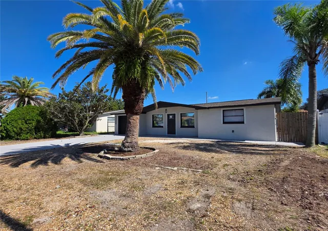 Photo 2 of Single family home for sale at 2910 Matchlock Dr, Holiday, FL 34690 | MLS# TB8560219 | Listing updated on 2026-10-22