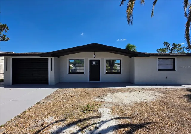 Photo 3 of Single family home for sale at 2910 Matchlock Dr, Holiday, FL 34690 | MLS# TB8560219 | Listing updated on 2026-10-22
