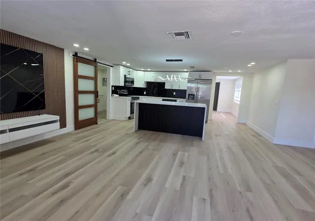 Photo 4 of Single family home for sale at 2910 Matchlock Dr, Holiday, FL 34690 | MLS# TB8560219 | Listing updated on 2026-10-22