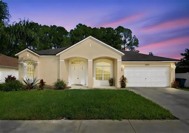 Photo 1 of Single family home for sale at 20827 Woodvale Ln, Land O Lakes, FL 34638 | MLS# TB8560275 | Listing updated on 2026-10-23