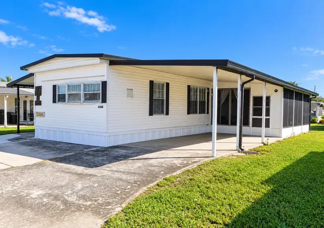 Photo 2 of Manufactured home for sale at 5306 Astrid Dr, Zephyrhills, FL 33541 | MLS# TB8560320 | Listing updated on 2026-10-22