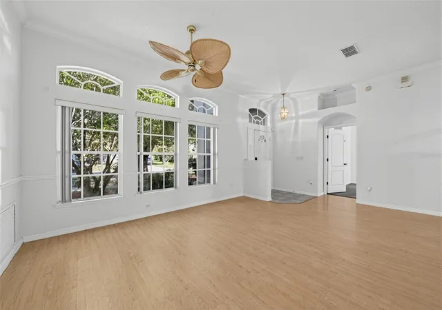 Photo 2 of Single family home for sale at 13838 Riverpath Grv Dr, Orlando, FL 32826 | MLS# O6451694 | Listing updated on 2026-10-23