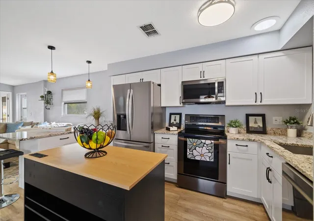 Photo 2 of Single family home for sale at 4405 Floramar Ter, New Port Richey, FL 34652 | MLS# W7890517 | Listing updated on 2026-10-29