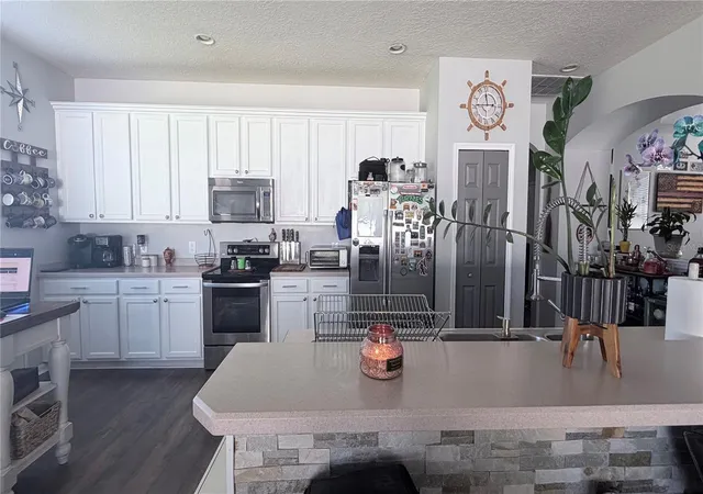 Photo 2 of Single family home for sale at 14038 Lake Live Oak Dr, Orlando, FL 32828 | MLS# O6451705 | Listing updated on 2026-10-23