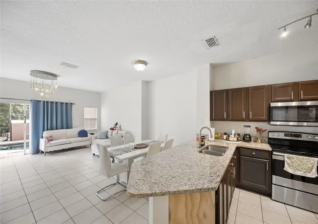 Photo 4 of Townhouse for sale at 4526 Alberto Cir, Kissimmee, FL 34746 | MLS# S5159970 | Listing updated on 2026-10-25