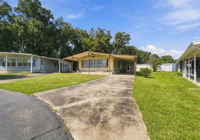 Photo 1 of Manufactured home for sale at 39353 Sycamore Ln, Zephyrhills, FL 33542 | MLS# TB8560416 | Listing updated on 2026-10-23