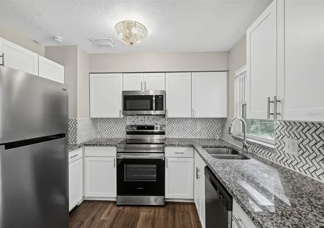 Photo 4 of Single family home for sale at 4750 Goldsboro Ct, Orlando, FL 32811 | MLS# O6451783 | Listing updated on 2026-10-28