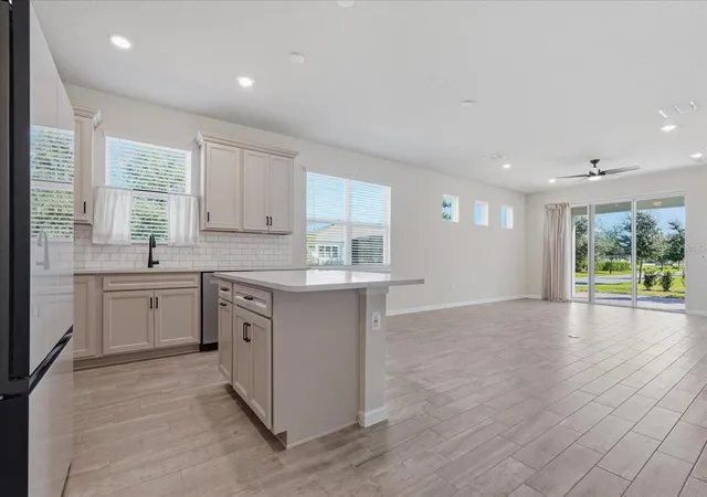 Photo 1 of House for sale at 13537 Splashing Isla Dr, Winter Garden, FL 34787 | MLS# TB8560424 | Listing updated on 2026-10-27