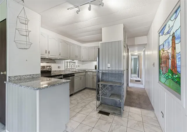 Photo 2 of Manufactured home for sale at 6147 Ridgewood Dr, Zephyrhills, FL 33542 | MLS# TB8560430 | Listing updated on 2026-10-22