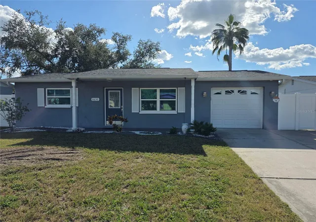 Photo 1 of Single family home for sale at 8630 Fox Holw Dr, Port Richey, FL 34668 | MLS# TB8560443 | Listing updated on 2026-10-23