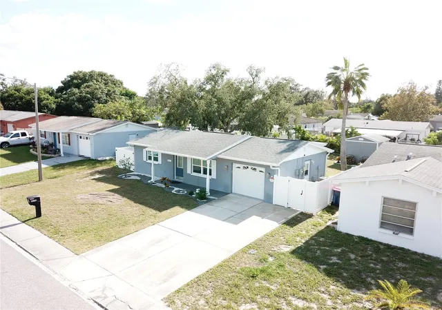 Photo 3 of Single family home for sale at 8630 Fox Holw Dr, Port Richey, FL 34668 | MLS# TB8560443 | Listing updated on 2026-10-23