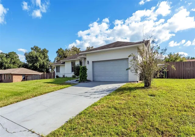 Photo 1 of Single family home for sale at 751 Cedar Knoll Dr N, Lakeland, FL 33809 | MLS# TB8560444 | Listing updated on 2026-10-23