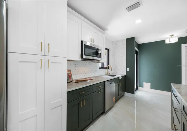 Photo 4 of Single family home for sale at 4707 W Paul Ave, Tampa, FL 33611 | MLS# TB8560459 | Listing updated on 2026-10-22