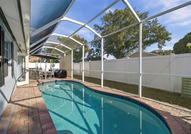 Photo 2 of Single family home for sale at 10118 Wheatley Hills Ct, Tampa, FL 33615 | MLS# TB8560489 | Listing updated on 2026-10-23