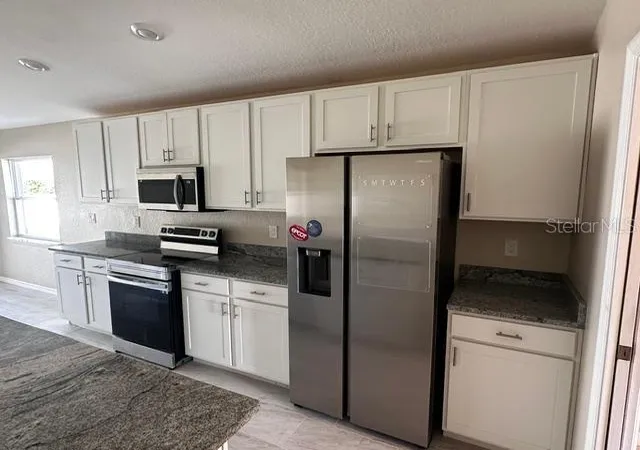 Photo 1 of Single family home for sale at 1073 Silas St, Haines City, FL 33844 | MLS# TB8560491 | Listing updated on 2026-10-23