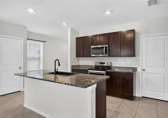 Photo 4 of Single family home for sale at 16121 Soft Fern Tr, Odessa, FL 33556 | MLS# TB8560501 | Listing updated on 2026-10-30