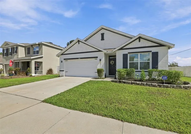Photo 1 of Single family home for sale at 1702 Johnson Pointe Dr, Plant City, FL 33566 | MLS# TB8560519 | Listing updated on 2026-10-23