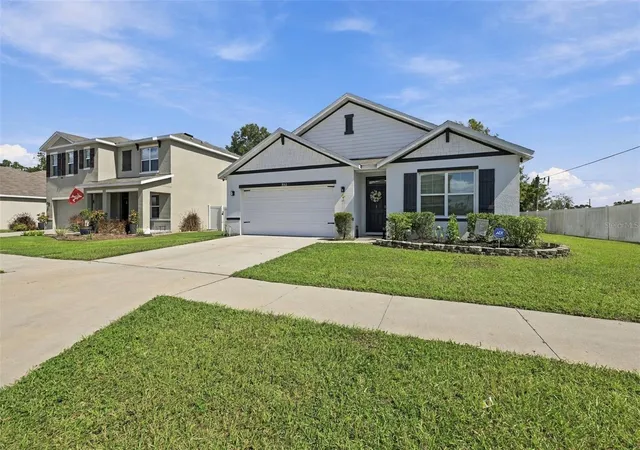 Photo 2 of Single family home for sale at 1702 Johnson Pointe Dr, Plant City, FL 33566 | MLS# TB8560519 | Listing updated on 2026-10-23