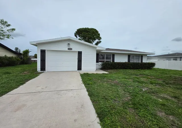 Single family home for sale at 2437 Ivanhoe St, PORT CHARLOTTE, FL 33952 | MLS# O6451888