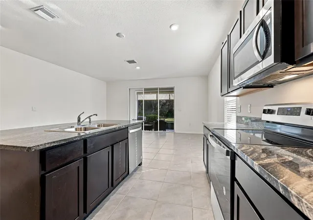 Photo 4 of Townhouse for sale at 13819 NW 9th Road, Newberry, FL 32669 | MLS# GC544370 | Listing updated on 2026-10-29