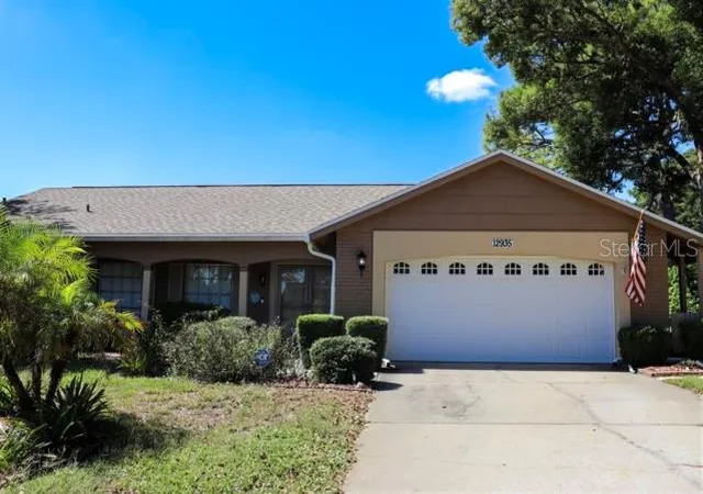 Photo 1 of Single family home for sale at 12935 Pebble Beach Cir, Hudson, FL 34667 | MLS# TB8560533 | Listing updated on 2026-10-23