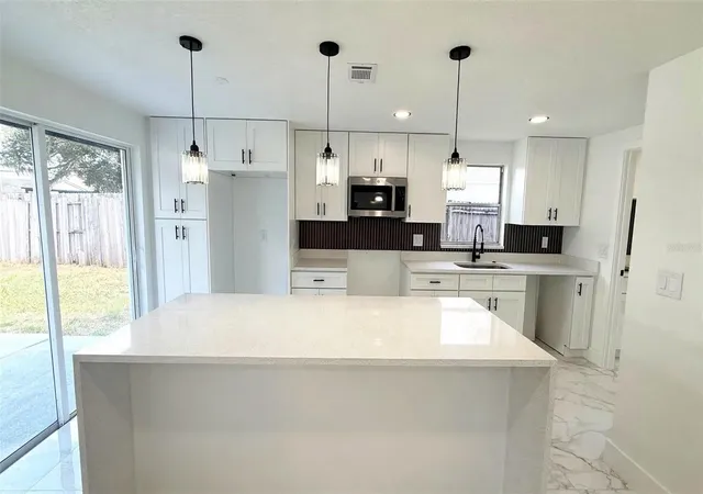 Photo 4 of Single family home for sale at 6807 White Cliffs Way, Tampa, FL 33625 | MLS# TB8560575 | Listing updated on 2026-10-23