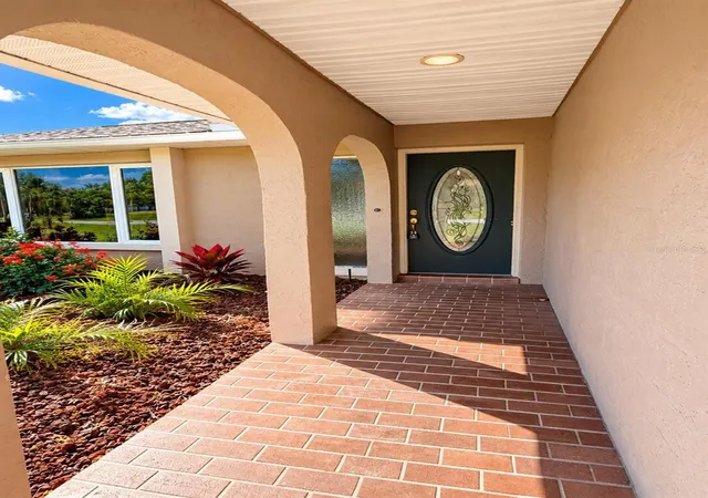Photo 2 of Single family home for sale at 423 Waterside St, Port Charlotte, FL 33954 | MLS# O6451924 | Listing updated on 2026-10-23