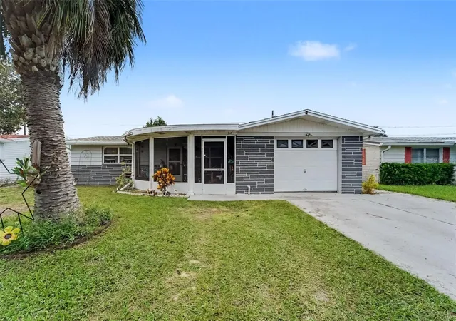 Photo 1 of Single family home for sale at 2049 Maureen Dr, Holiday, FL 34690 | MLS# TB8560603 | Listing updated on 2026-10-23