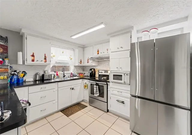 Photo 3 of Single family home for sale at 2049 Maureen Dr, Holiday, FL 34690 | MLS# TB8560603 | Listing updated on 2026-10-23