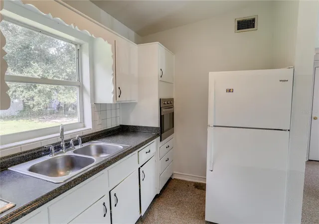 Photo 4 of House for sale at 6410 Calypso Dr, Orlando, FL 32809 | MLS# O6451935 | Listing updated on 2026-10-29
