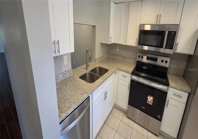 Photo 2 of Condo for sale at 4141 Stratford Dr #A, New Port Richey, FL 34652 | MLS# W7890549 | Listing updated on 2026-10-23
