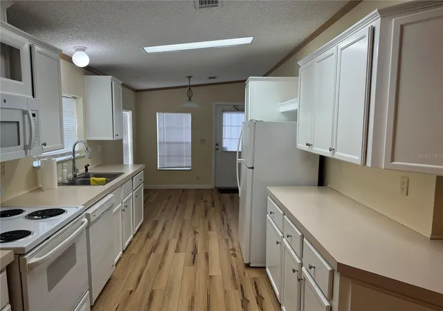 Photo 3 of Manufactured home for sale at 8930 Ehren Cutoff, Land O Lakes, FL 34639 | MLS# TB8560642 | Listing updated on 2026-10-23