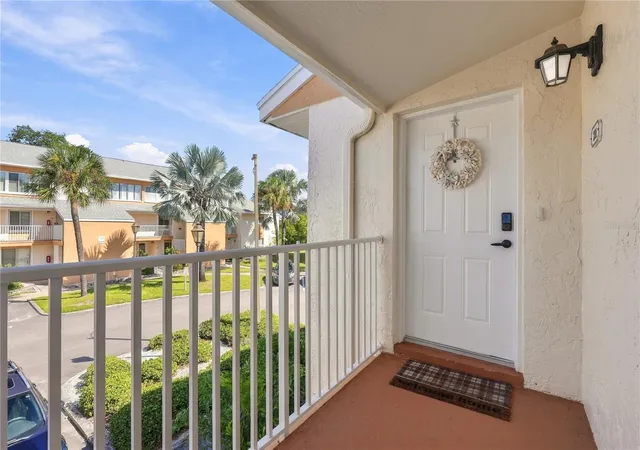 Photo 1 of Condo for sale at 690 99th Avenue N #201, Saint Petersburg, FL 33702 | MLS# A4710517 | Listing updated on 2026-10-23