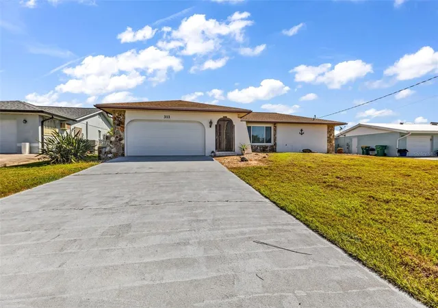 Single family home for sale at 311 W Tarpon Blvd NW, PORT CHARLOTTE, FL 33952 | MLS# C7532363