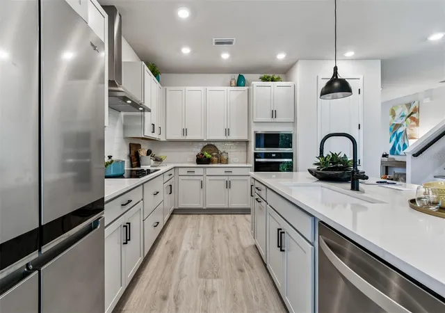 Photo 4 of Single family home for sale at 3611 Yellow Cassia Dr, Wesley Chapel, FL 33543 | MLS# TB8560704 | Listing updated on 2026-10-23