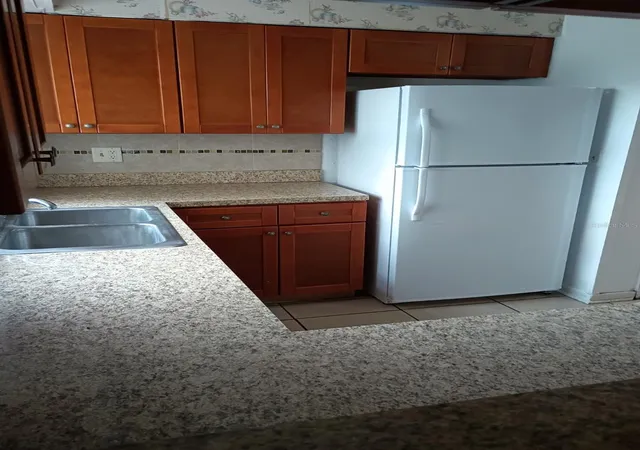 Photo 2 of Single family home for sale at 1320 Pleasant Pl, Lakeland, FL 33801 | MLS# L4965987 | Listing updated on 2026-10-27