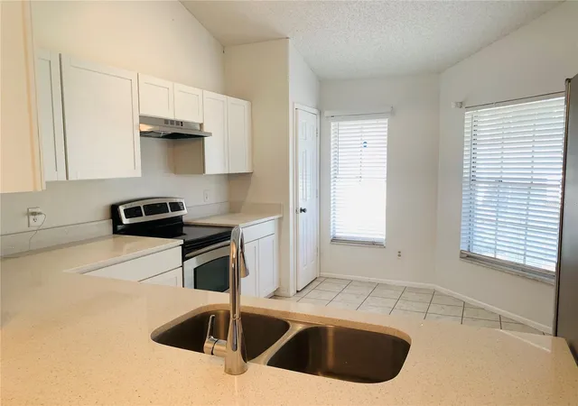 Photo 4 of Single family home for sale at 7651 Eldorado Pl, Orlando, FL 32818 | MLS# O6452038 | Listing updated on 2026-10-28