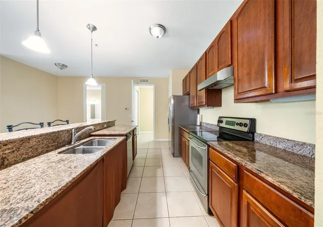 Photo 3 of Condo for sale at 5036 Shoreway Loop #10205, Orlando, FL 32819 | MLS# O6452083 | Listing updated on 2026-10-23