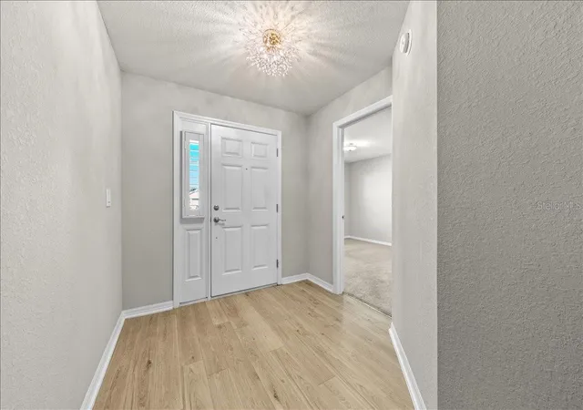 Photo 3 of Single family home for sale at 1041 Montgomery Ln, Polk City, FL 33868 | MLS# TB8560786 | Listing updated on 2026-10-23
