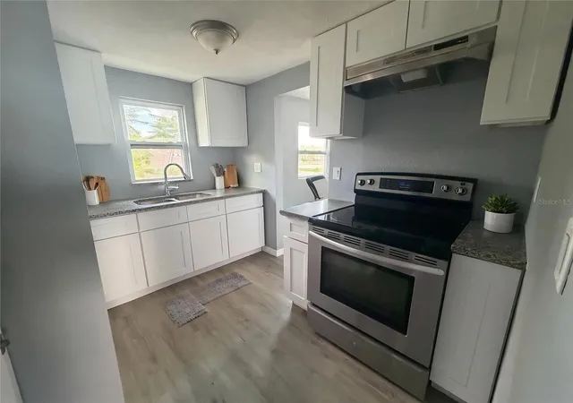 Photo 3 of Multi family home for sale at 1208 17th Street N, Saint Petersburg, FL 33713 | MLS# TB8560815 | Listing updated on 2026-10-24