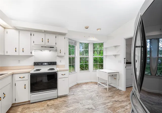 Photo 4 of Single family home for sale at 8297 SW 108th Loop, Ocala, FL 34481 | MLS# TB8560818 | Listing updated on 2026-10-29