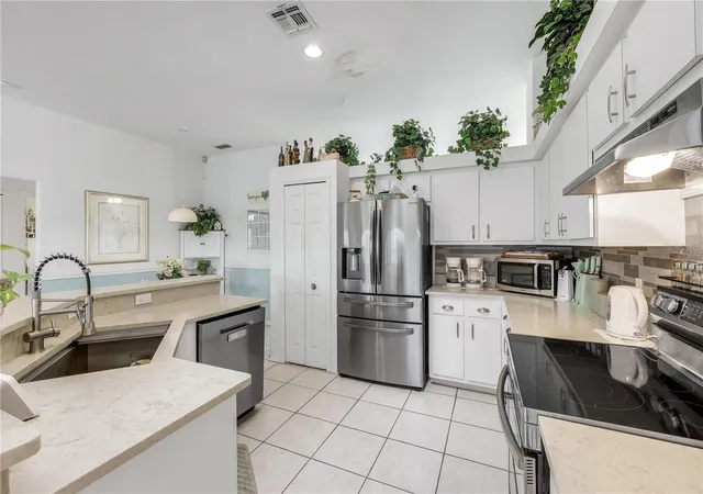 Photo 3 of Single family home for sale at 305 SE 31st Street, Cape Coral, FL 33904 | MLS# C7532401 | Listing updated on 2026-10-23