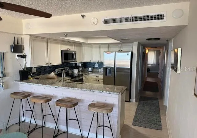 Photo 3 of Condo for sale at 4139 S Atlantic Ave #B102, New Smyrna Beach, FL 32169 | MLS# O6452172 | Listing updated on 2026-10-23