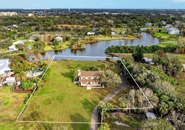 Photo 2 of Single family home for sale at 1914 24th Avenue W, Palmetto, FL 34221 | MLS# A4710598 | Listing updated on 2026-10-23