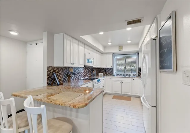 Photo 4 of Condo for sale at 860 S Village Dr N #105, Saint Petersburg, FL 33716 | MLS# TB8560886 | Listing updated on 2026-10-23