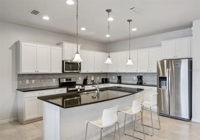 Photo 3 of Single family home for sale at 8849 Corcovado Dr, Kissimmee, FL 34747 | MLS# O6452204 | Listing updated on 2026-10-29